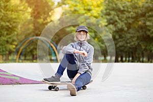 Skater girl on skatepark moving on skateboard outdoors.