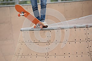 Skater legs skating on ramp