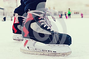 Skater legs at skating rink