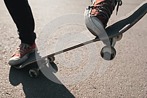 Skater make olly trick exercise.