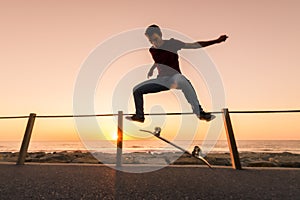 Skater make trick kickflip photo