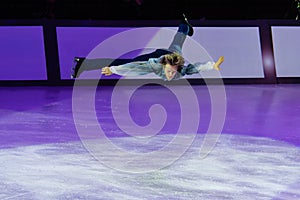 Skater performing a Jump and Artistic and Technical performance on the Ice Rink