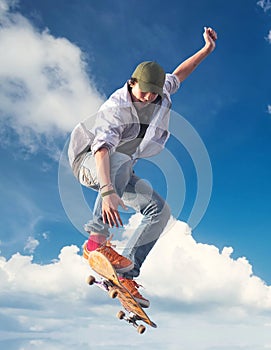 Skater on the sky background