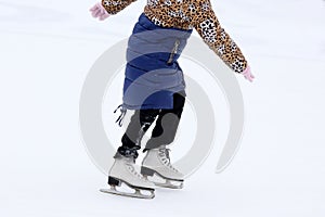 Skating girls on the ice rink