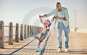 Skating, learning and father holding hands of his child while teaching her on the beach promenade. Family, love and dad