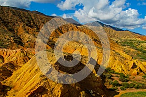 Yellow and red mountain in Asia at rock formation erosion valley