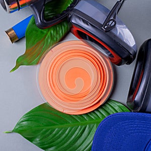 Skeet shooting. Flat lay composition with clay target