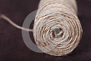 Skein of twine on a brown background