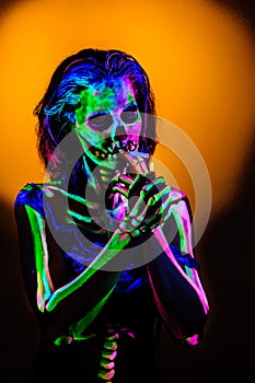 Skeleton bodyart with blacklight