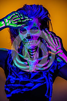 Skeleton bodyart with blacklight