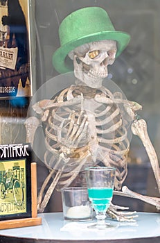 Skeleton in a green hat