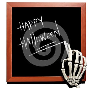 Skeleton writes Happy Halloween