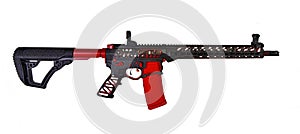 Skeletonized AR15 rifle in black and red.