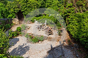 Skeletons sitting outside at a table at medieval Gößweinstein Castle in Franconian Switzerland, Bavaria, Germany