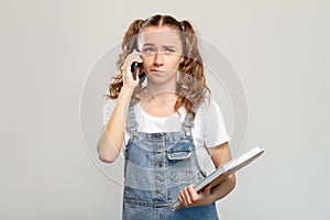 Skeptic girl portrait disturbing phone call mobile