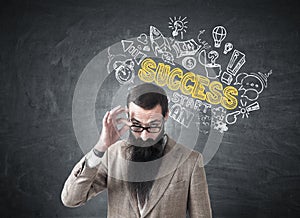 Skeptical man and success icons on blackboard