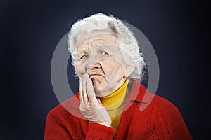 Skeptical old elderly woman photo