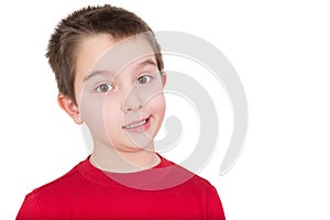 Skeptical young boy reacting in disbelief photo