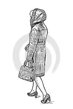 Sketch of a casual townswoman going down the street photo