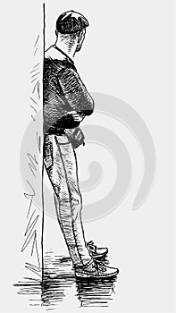 Sketch of casual urban man leaning against wall, waiting and looking away