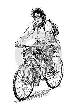 An elderly townswoman rides a bicycle photo