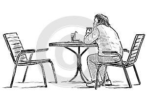 Sketch of lonely townsman sitting in outdoor caffe in wait