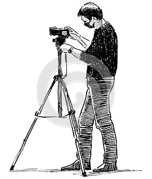 Sketch of professional photographer with tripod at a work