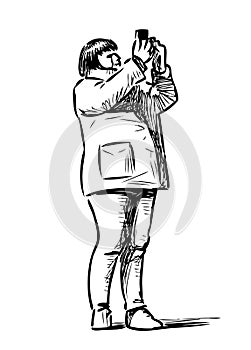 Sketch of a townswoman taking picture on her smartphone photo