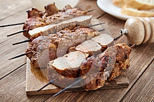 Skewered meat or shish kebabs of pork in marinade