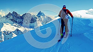 Ski with amazing view of swiss famous mountains in beautiful win