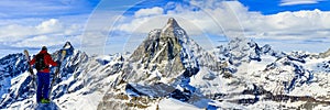 Ski with amazing view of swiss famous mountains in beautiful winter snow Mt Fort. The skituring, backcountry skiing in fresh