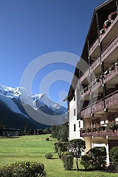 Ski chalet hotel, European alps, vertical copy space