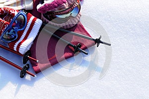Ski equipment and snow background, clothes, poles, white snow copy space