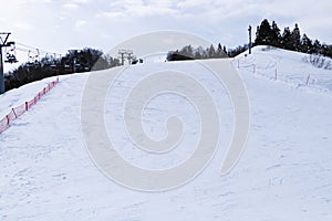 Ski field large white snow on slopes. Tourists come to play winter sports. Ski slopes snow.