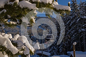 Ski gondola lift in mountains ski attraction. Mountains winter landscape view