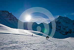 Ski holiday, sunny day in popular Alpine ski resort, Solda