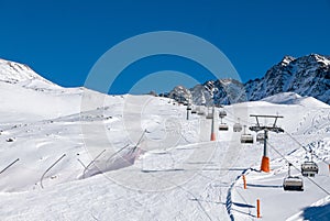 Ski holiday, sunny day in popular Alpine ski resort, Solda