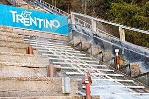 Ski jump ramp in water and snow. Pellizzano, Ski region Val di Sole, Trento, Trentino, Italy