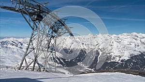 Ski lift in the Alps during skiing season. Time lapse.
