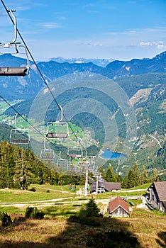 Ski Lift in Austrian Apls with Bright Sunlight. In Summer