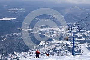 Ski lift, cable car funicular with open cabin on the background