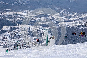 Ski lift, cable car funicular with open cabin on the background