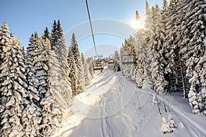 Ski lift with chairs in Kopaonik resort in Serbia photo