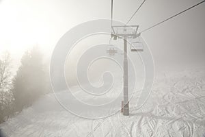 Ski lift in the clouds