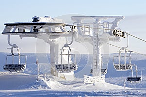 Ski lift covered in snow