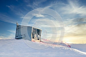 Ski lift gondola station in the evening light on the Sellaronda Dolomites photo