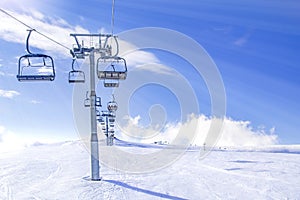 Ski lift and mountain landscape in winter, generic ski resort