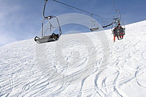 Ski lift and skiers