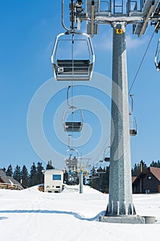 Ski lift at skiing resort.