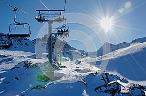 Ski lift and slope on the mountain